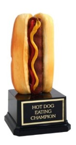 A step up from a critics award would be the hot dog eating award. This award will be given out at the County Fair this year along with the award for the "Best Carnie with a Beard".