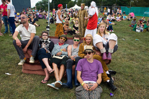 People sitting on a sofa watch a band play on the main stage at the Standon Calling Festival in Hertfordshire, UK Standon Calling is a small independent festival set among the hills in Herfordshire that showcases World Music, Indie Music and dance Music. It is one of the new, small and quirky boutique festivals which have become popular in the UK.